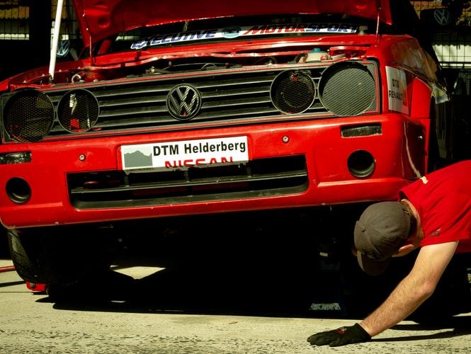 Lifting a car using a floor jack