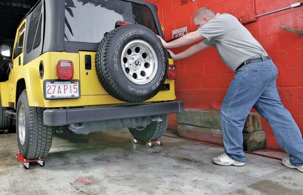 Jeep on car dollies